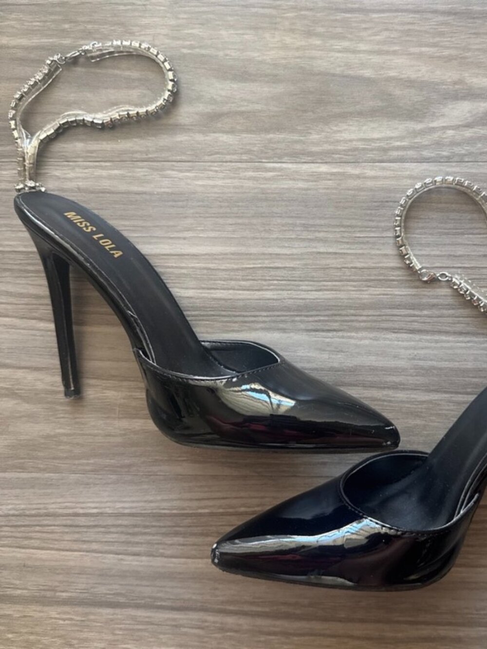 Miss Lola Black Patent Leather Stiletto Heels with Silver Chain Anklet Detail